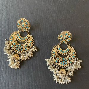Ornate gold tone chandelier pierced earrings